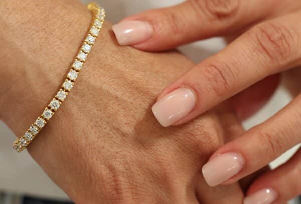 Tennis armbånd i 14 karat guld (6.60ct)
